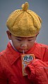 Chinese child drinking from juicebox.jpg